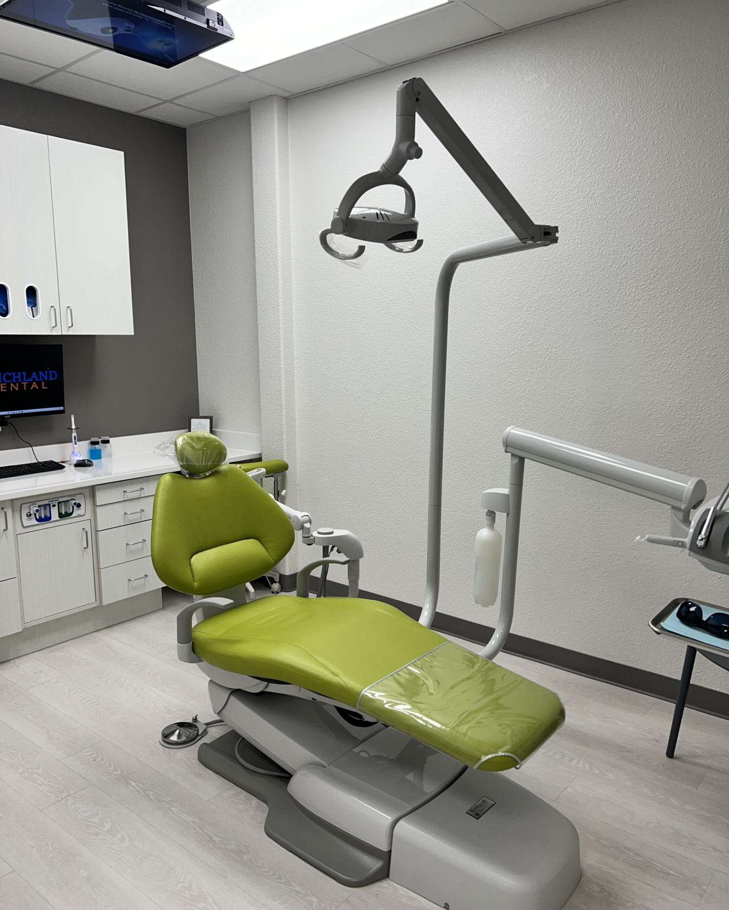 Front desk and refreshment station in dental office waiting area